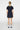 J.LINDEBERG AMELIE MID GOLF SKIRT JL NAVY